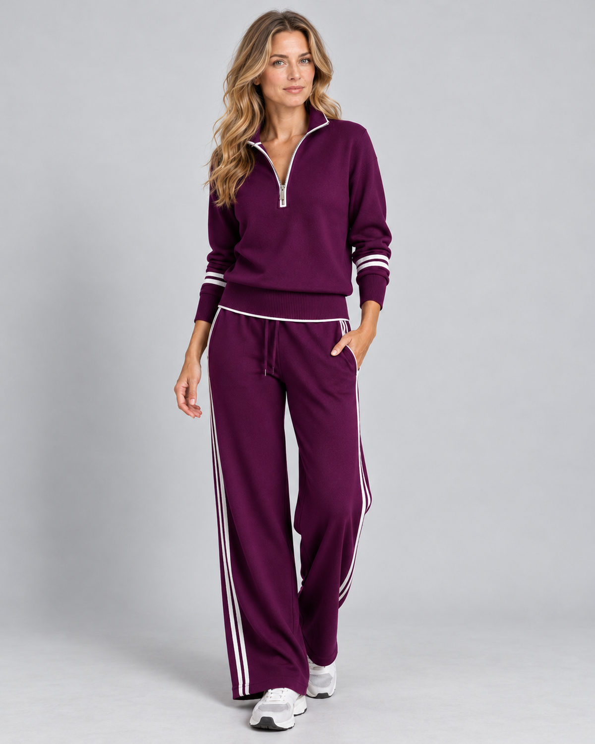 Purple knitted quarter-zip jumper and wide-leg trousers, front view on Ellis & Rowe model