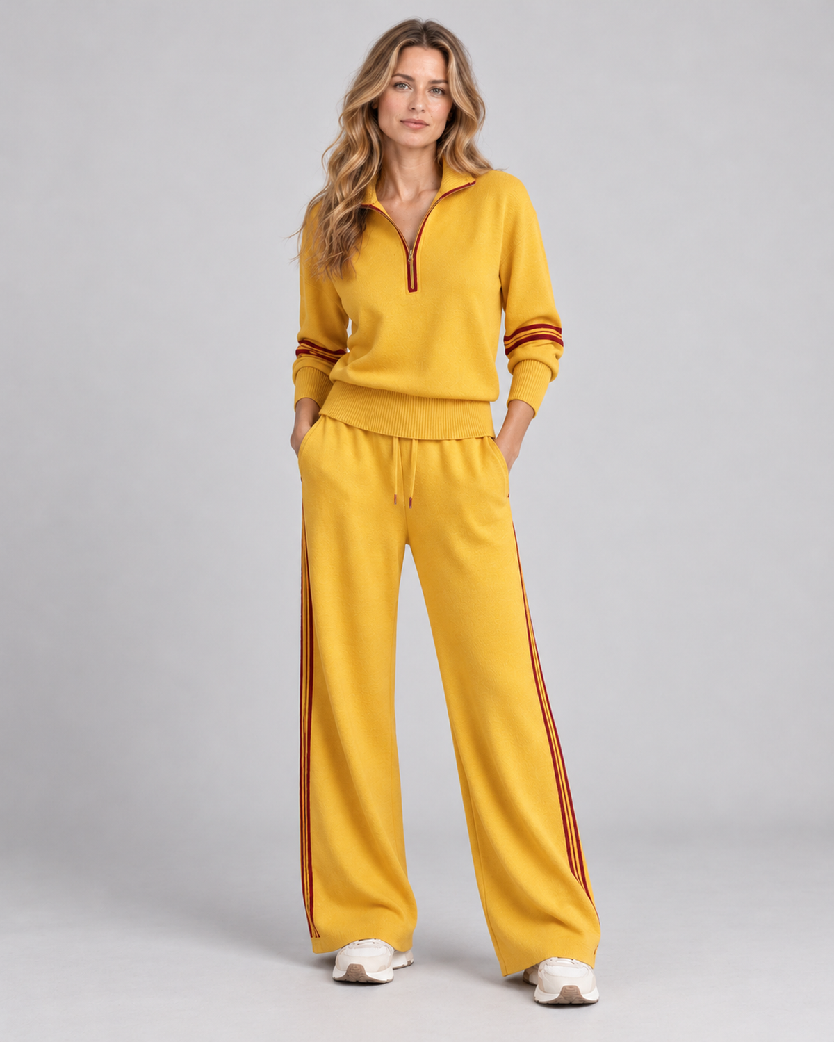 Yellow knitted quarter-zip jumper and wide-leg trousers, front view on Ellis & Rowe model