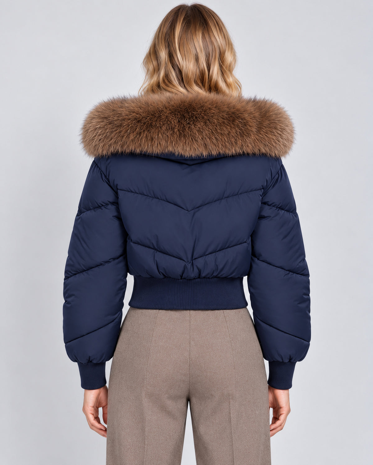 Women's cropped quilted zip-up puffer jacket, navy rear view