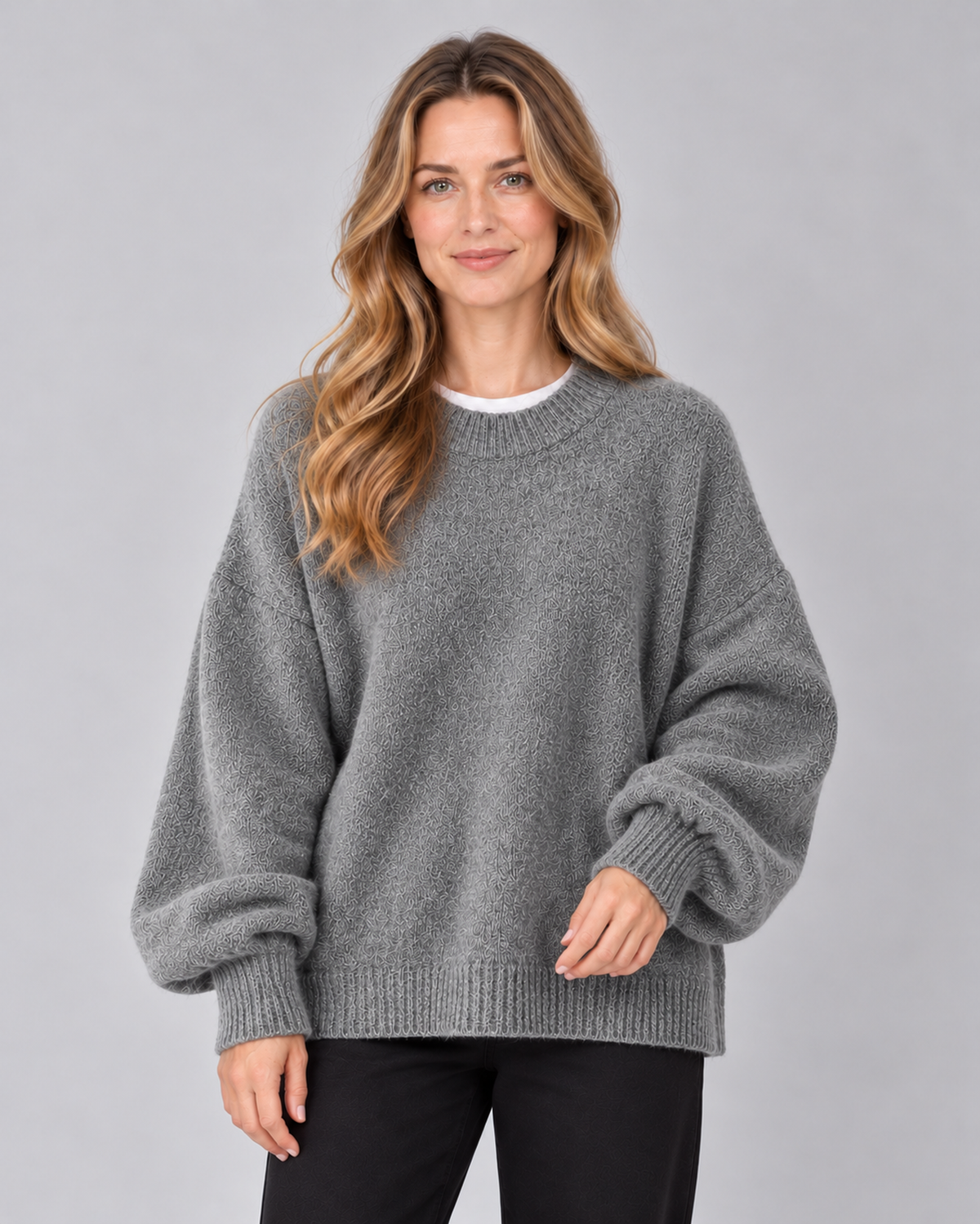 Women's round neck drop shoulder split hem jumper, dark grey front, studio model photograph