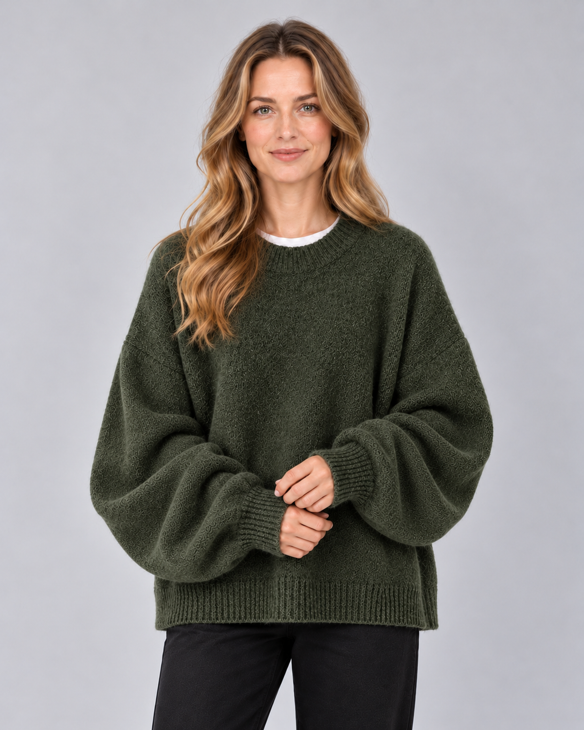 Women's round neck drop shoulder split hem jumper, olive green front, studio model photograph
