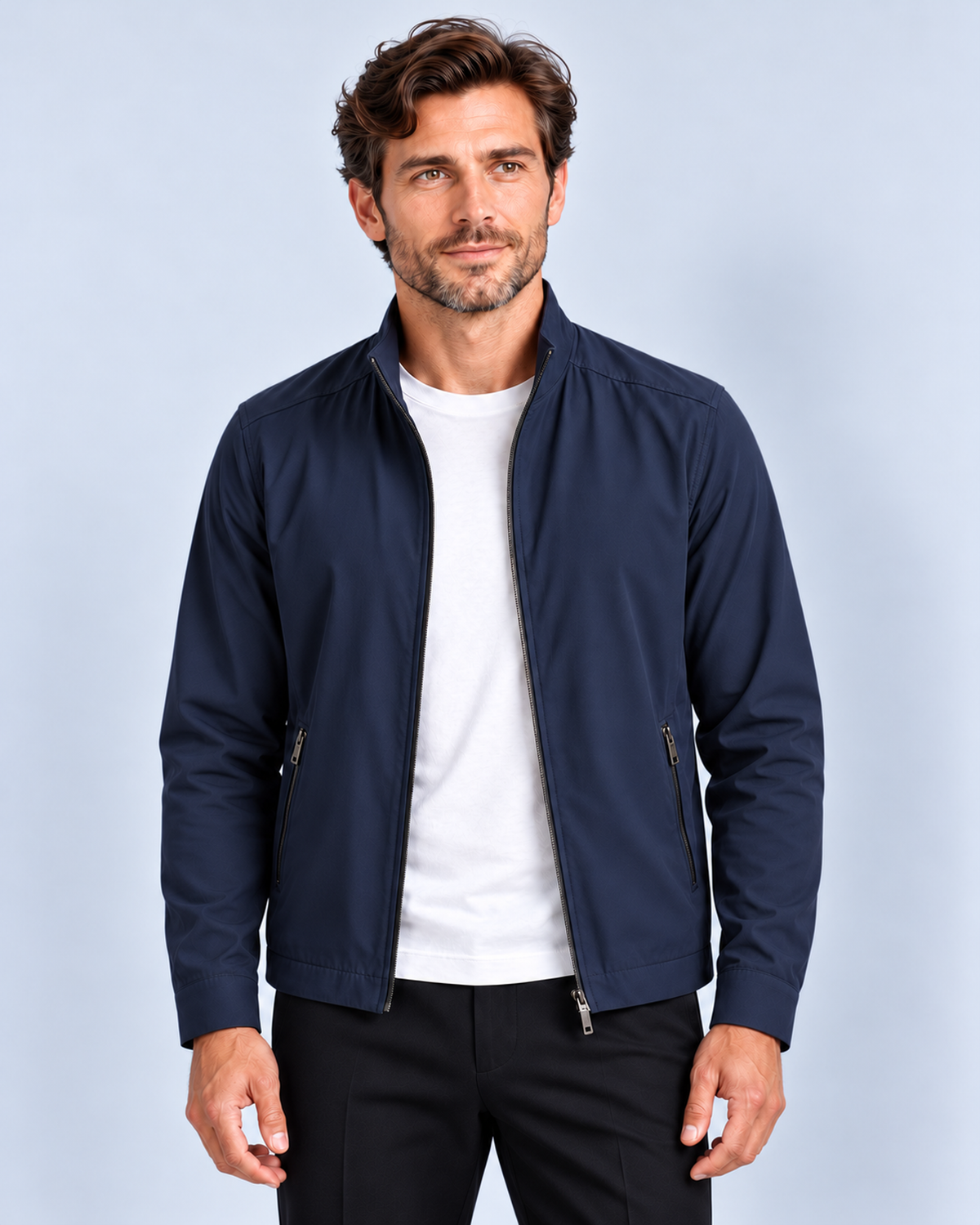 Men's premium zip-up jacket, navy front view on model in light-grey studio