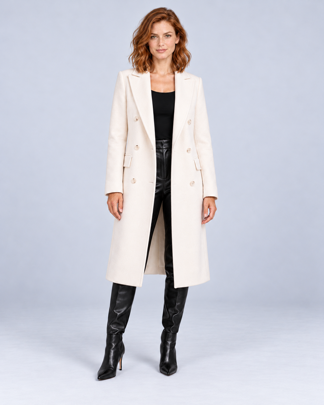 Women's long double-breasted overcoat in Apricot, front view on model.