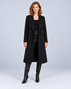 Women's long double-breasted overcoat in Black, front view on model.