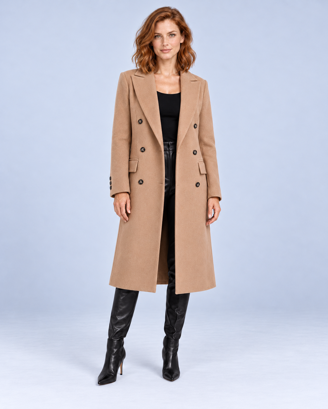 Women's long double-breasted overcoat in Caramel, front view on model.