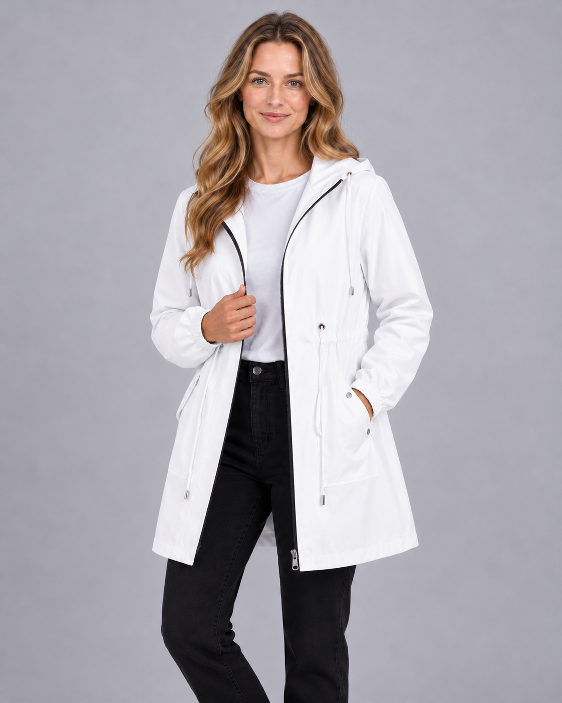 Women's lightweight hooded rain coat in white, front view on model