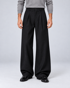 Men's black pinstripe wide-leg trousers, front