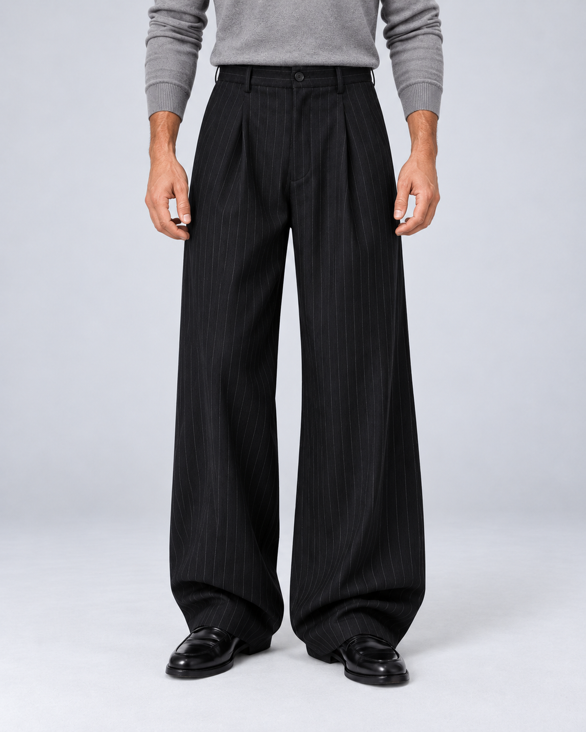 Men's black pinstripe wide-leg trousers, front