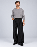 Men's black pinstripe wide-leg trousers, full-body