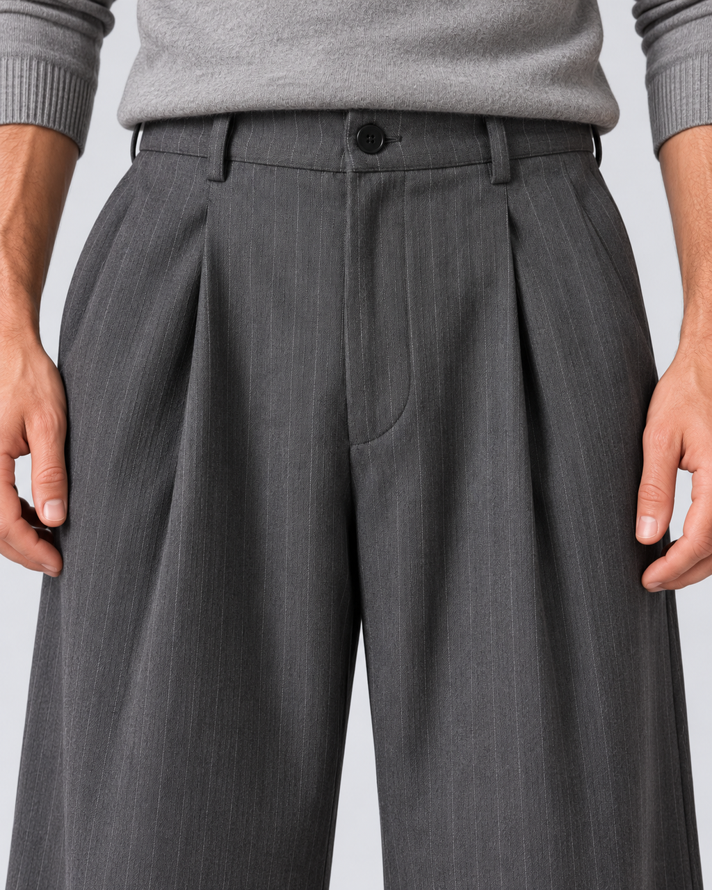 Men's grey pinstripe wide-leg trousers, waist detail