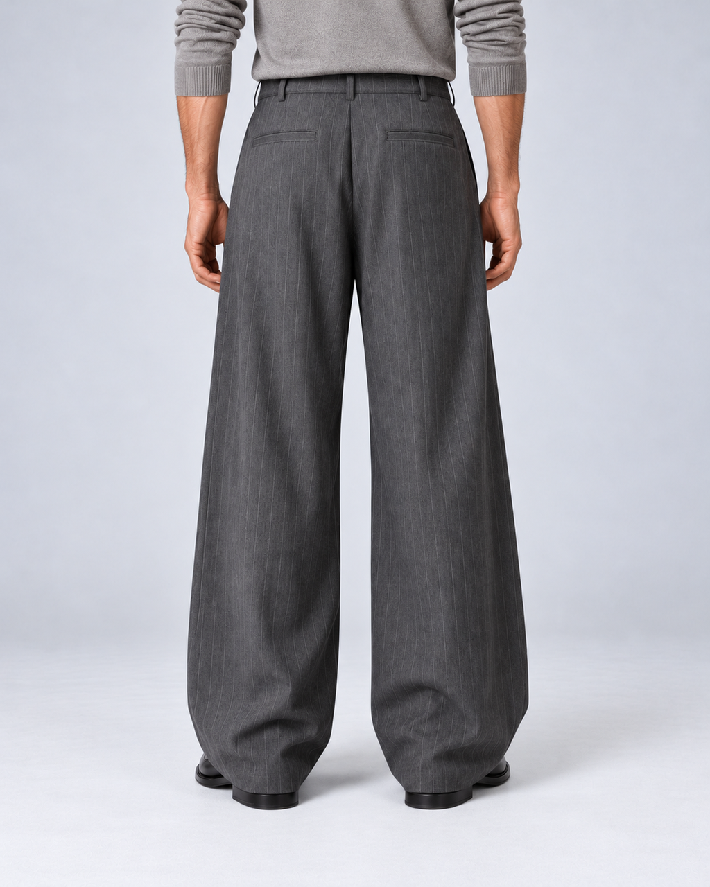 Men's grey pinstripe wide-leg trousers, rear
