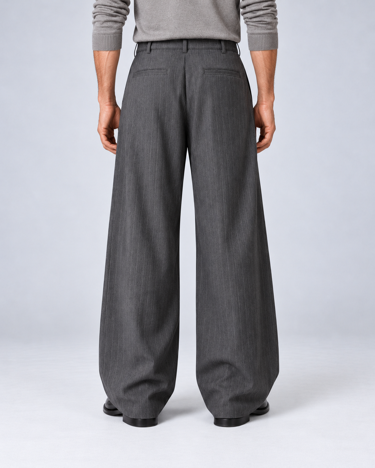 Men's grey pinstripe wide-leg trousers, rear