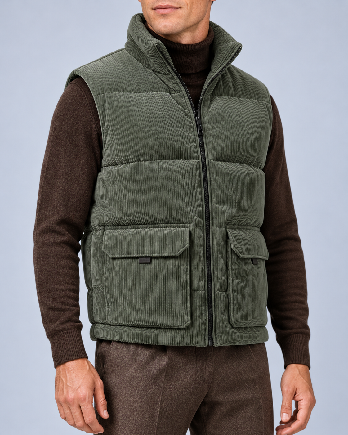 Ellis & Rowe corduroy padded vest, Army Green, closed-torso-detail studio photograph