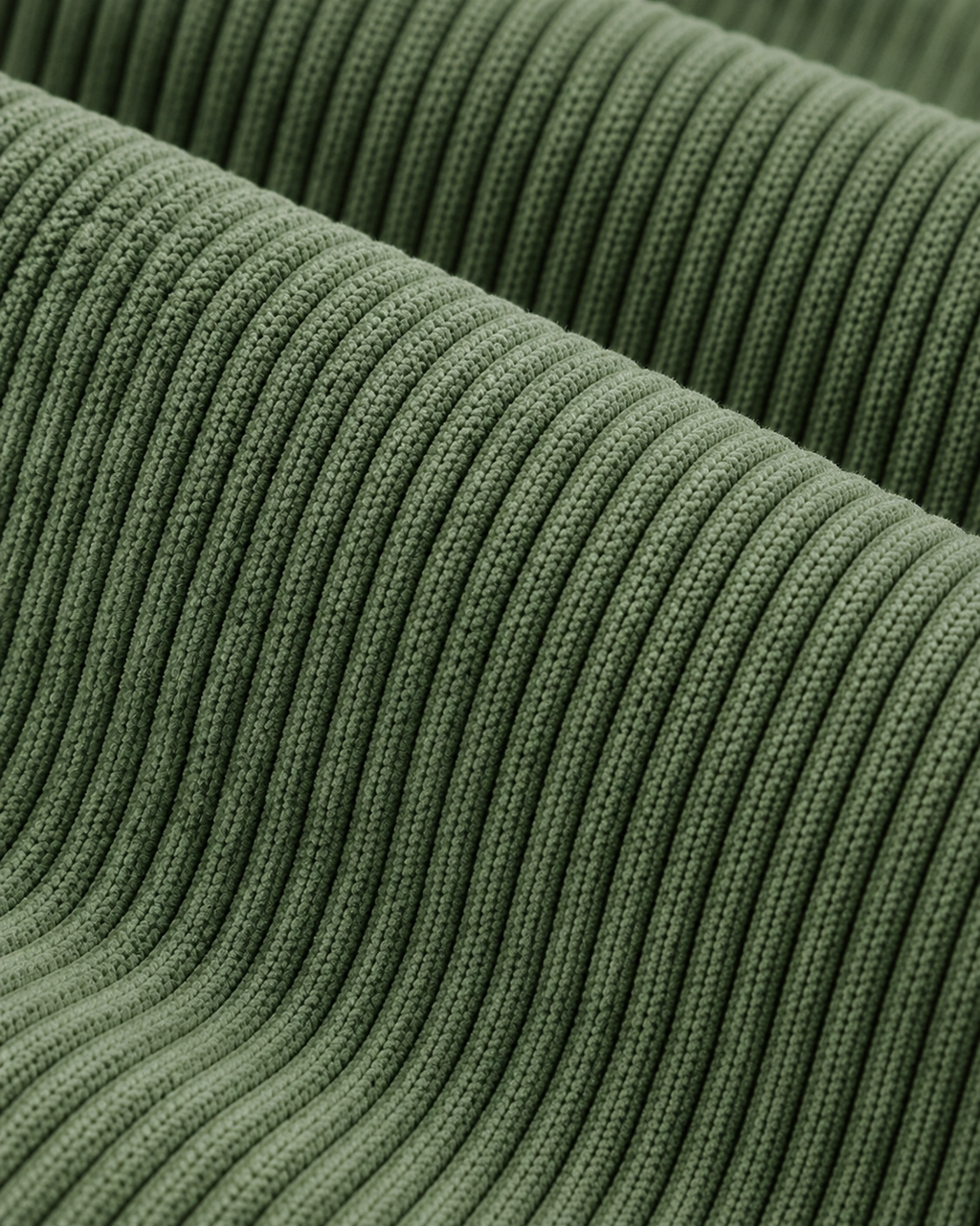 Ellis & Rowe corduroy padded vest, Army Green, fabric-macro studio photograph