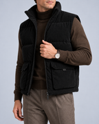 Ellis & Rowe corduroy padded vest, Black, open-torso-detail studio photograph