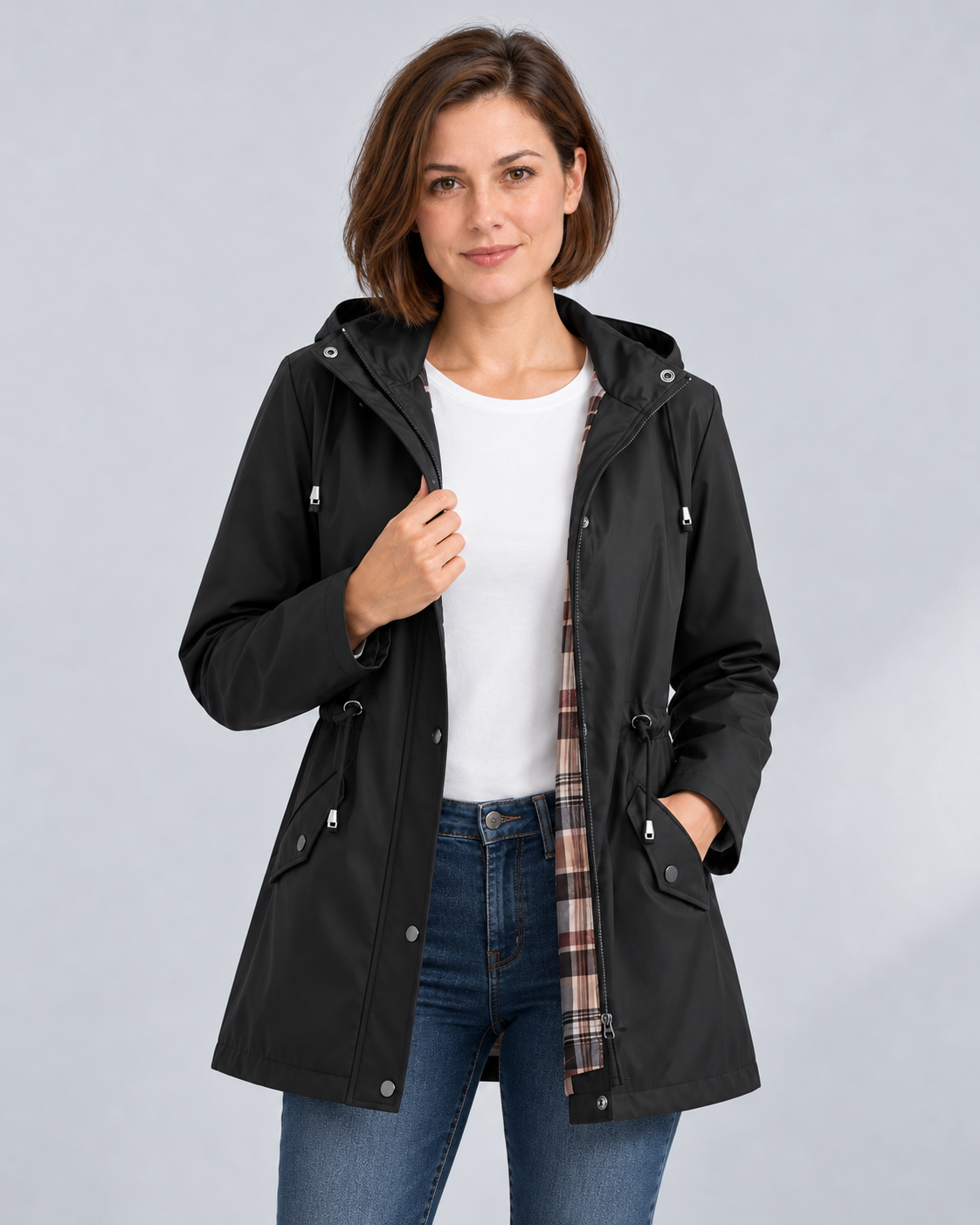 Women's black hooded check-lined raincoat, front view