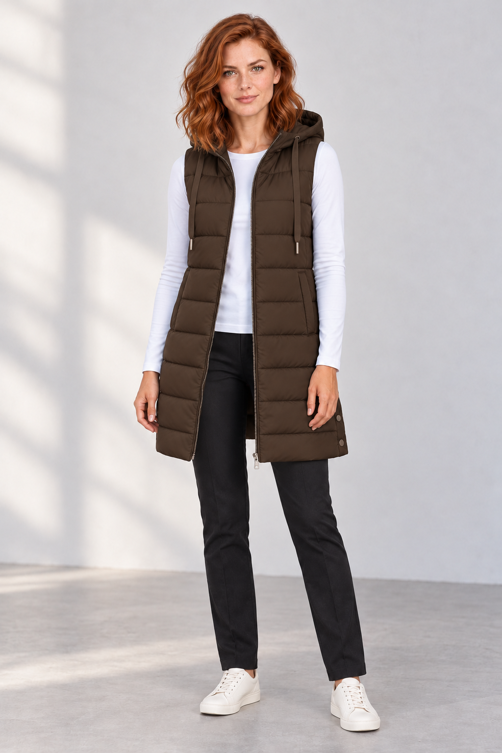 Women's Longline Hooded Zip-Up Puffer Vest in Dark Brown, front view
