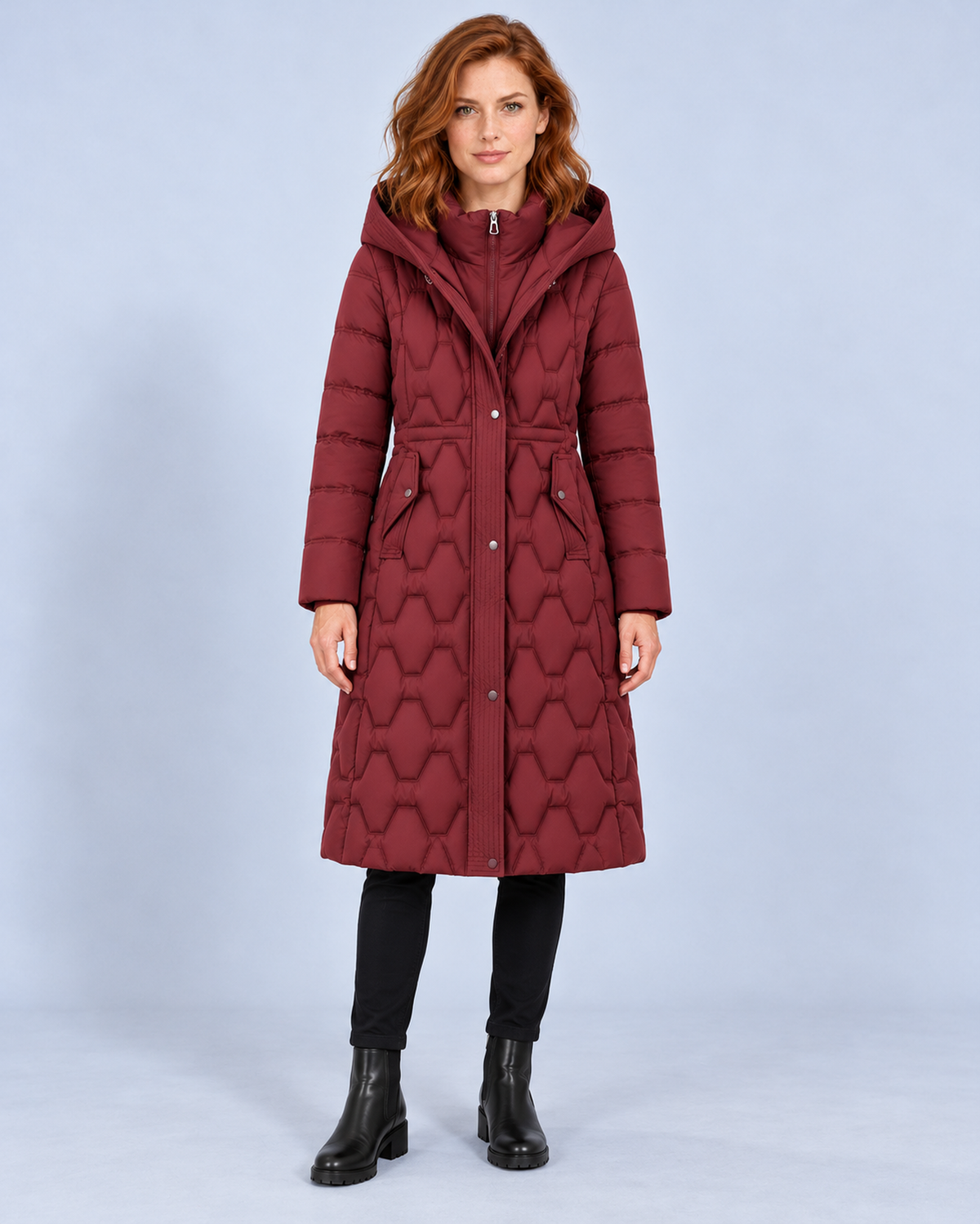 Women's longline hooded quilted down coat in red, front styling view on ER-W05