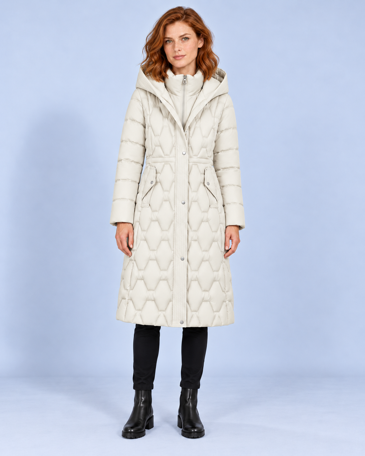 Women's longline hooded quilted down coat in white, front styling view on ER-W05